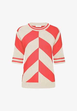 Pull court à manches courtes crème et rouge avec un motif en chevrons audacieux et des accents rayés contrastants aux poignets et au col.