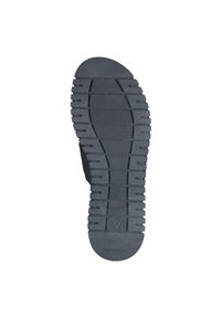 Suola di scarpa in gomma nera con superficie testurizzata, dotata di scanalature e creste profonde per una migliore aderenza. Logo del produttore visibile sul fondo.