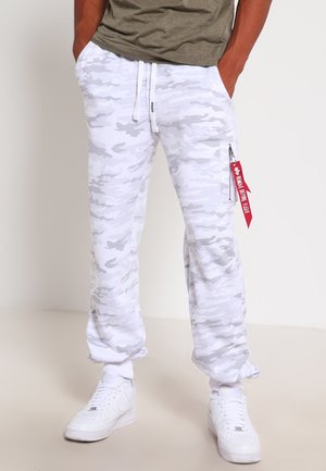 FIT PANT - Verryttelyhousut - white