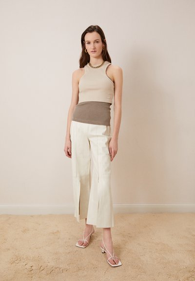 By Malene Birger WARRAN - Leather trousers - cream snow