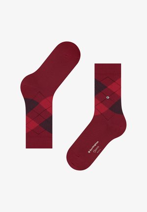 Karmesinrote Socken mit Argyle-Muster in dunkleren Farbtönen, glatter Textur, verstärkter Ferse und Bündchen mit Markenzeichen auf der Sohle.