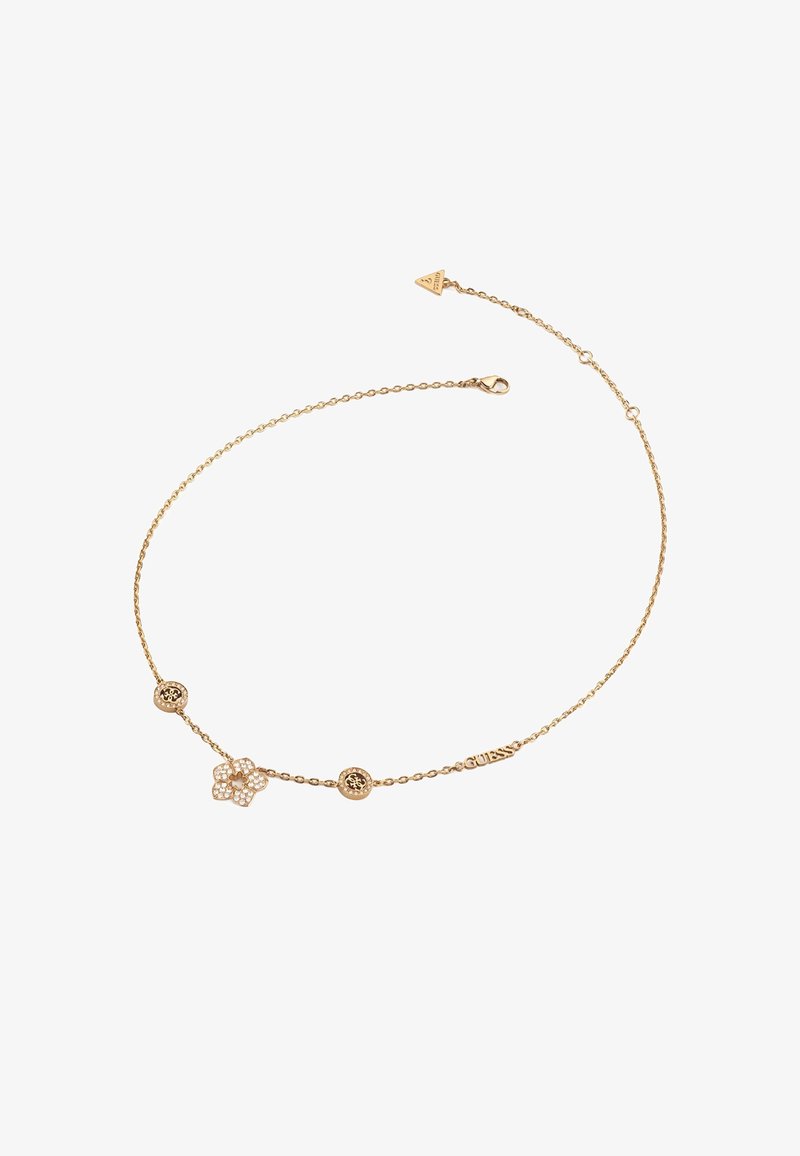 Halskette aus vergoldetem Metall mit drei Anhängern: einem floralen Design und zwei runden Akzenten, versehen mit einem Markennamensschild. Verstellbarer Verschluss.