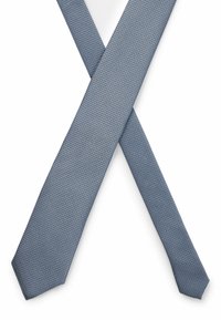 Blue textured tie with a diagonal pattern, featuring a narrow design and pointed tips, laid in a crossed position on a white background.