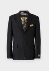 TAILORING - Suknjič - black