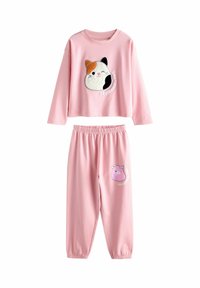 Pink two-piece loungewear set made of soft material. Features a long-sleeve top with a cat graphic and matching bottoms with a cow graphic.