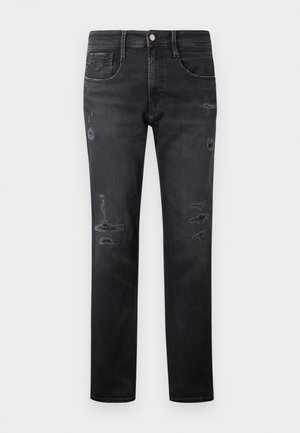 Jeans in denim nero con una vestibilità dritta, caratterizzati da strappi, cinque tasche, un piccolo bottone in metallo e passanti per la cintura in vita.