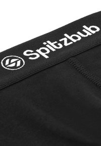Zwart ondergoed met een zachte tailleband met het witte "Spitzbub"-logo. Gladde stof met zichtbare stikdetails.