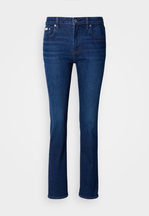 Mörkblå denimjeans med rak passform, subtila blekningar, framfickor och en klassisk knäppning i midjan.