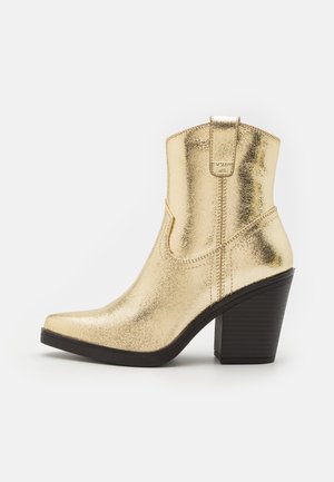 Call it Spring, Bottines de cowboy / motard - gold-coloured