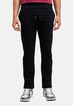 MONOGRAM FLOCK DI STEFANO - Stoffhose - schwarz