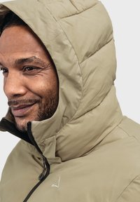 Schöffel URBAN INS STYLE LODOS - Winterjacke - braun