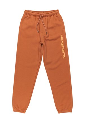 Orange sweatpants made of soft fabric with an elastic waistband and drawstring. Features Quiksilver logo in yellow on the left leg.