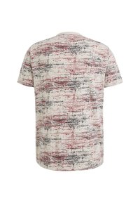 Kortærmet t-shirt i creme med et multifarvet abstrakt mønster i rød og sort, med rund halsudskæring og afslappet pasform.