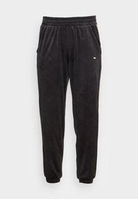 Schwarze Samt-Jogginghosen mit einem Rautenmuster, elastischem Bund, Seitentaschen und einem kleinen goldenen Logo-Akzent am linken Oberschenkel.