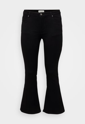 Sorte flare jeans lavet af blød denim, med en tætsiddende talje, frontlommer og en flagrende kant for en afslappet pasform.