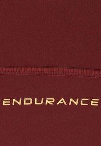 Endurance RALEIGH - Sport-BH med lätt stöd - syrah