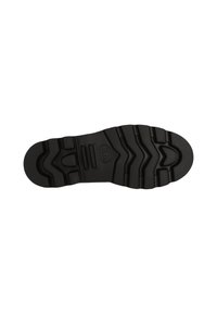 Suela de zapato de goma negra con surcos, ranuras y patrones texturizados prominentes para un mejor agarre. Presenta una punta redondeada y un diseño estructurado.