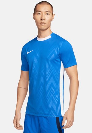 Blauwe sportt-shirt met een zigzagpatroon, korte mouwen en witte accenten op de schouders. Gemaakt van lichtgewicht, ademend materiaal.