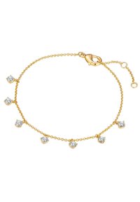 Bracelet en or avec cinq cristaux transparents étincelants montés dans des accents en forme de griffes, avec une fine chaîne et un fermoir en homard pour un maintien sécurisé.