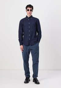 Tommy Hilfiger HARLEM STRUCTURE - Chino-püksid - desert sky