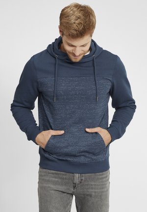 Sudadera marina con un patrón texturizado en el pecho, que presenta capucha con cordón y bolsillos frontales. Puños y dobladillo de canalé.