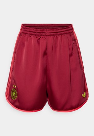 Maroon athletic shorts with elastic waistband, contrasting pink trim, green logo, and embroidered emblem with two stars. Smooth polyester texture.