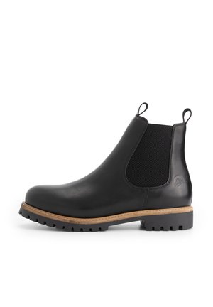 Zwarte leren Chelsea-boot met elastische zijpanelen, bruine leren rand, lussen op de enkel en een stevige, profielzool.