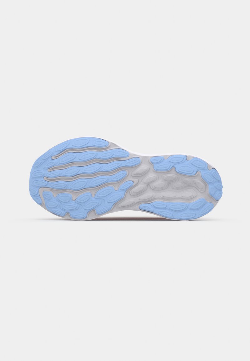 Suela de zapato con un patrón de tracción de goma azul claro y una superficie texturizada gris. Diseño flexible con contornos en forma de ola para un buen agarre y comodidad.