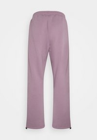 Helle lila Sweatpants mit einem elastischen Bund und Kordelzügen, die eine glatte Textur und leicht ausgestellte Beinöffnungen aufweisen.