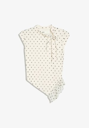 Weisse Kurzarmbluse mit grauen Polka-Dots, einer Halsbandschleife rechts und einem asymmetrischen Volant-Saum auf der linken Seite.