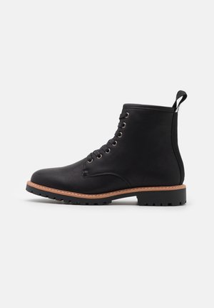 Botines con cordones - black