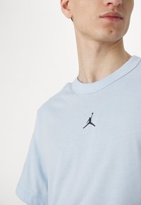 Jordan TOP - Sports T-shirts - celestine blue/black
