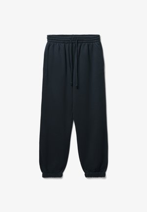 Pantaloni sportivi neri realizzati in tessuto morbido, dotati di vita elasticizzata con cordino, tasche laterali e polsini a costine alle caviglie.