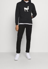 Nike SB Felpa con cappuccio - black