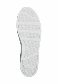 Suola di scarpa in gomma bianca con un motivo geometricamente testurizzato. Presenta una forma arrotondata e un logo del marchio Toms vicino al tallone.