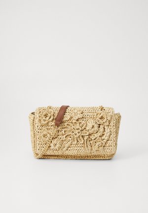 Woven straw handbag with a floral crochet pattern, tan leather strap, and gold chain accent. Rectangular shape, natural color.