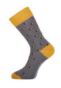 Chaussette grise avec un manchon, un orteil et un talon jaunes, ornée de petits motifs triangulaires noirs et jaunes et du texte "SERGE BLANCO" sur la semelle.