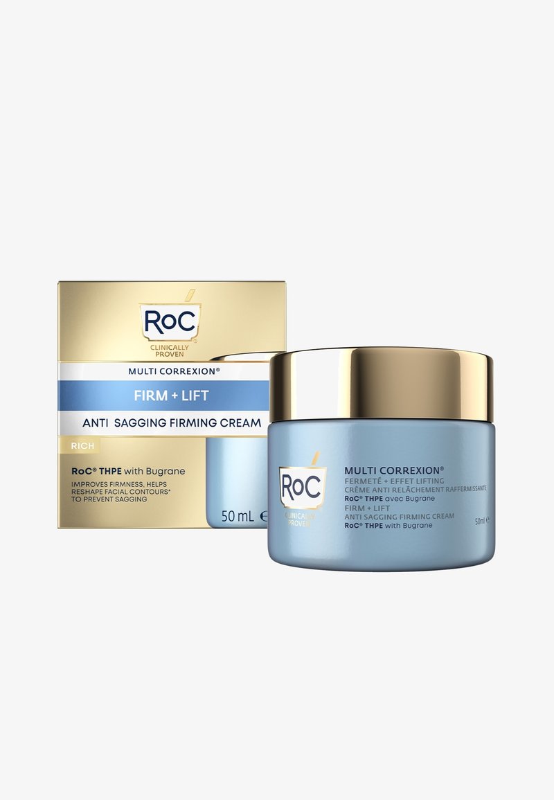 Anti-sagging firming cream in a light blue glass jar with a silver metallic lid. Box features gold accents and printed text in blue. 50 mL.