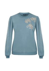 Svetle modrá mikina s nařasenými rukávy, žebrovanými manžetami a lemem. Na hrudi se pyšní složitými vyšívanými květinovými vzory v světlejších odstínech.