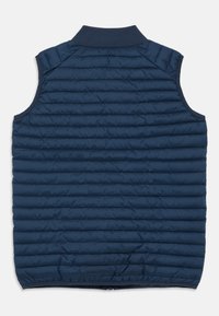 Mörkblå ärmlös puffer-väst med horisontell quiltad sömnad, hög krage och öppen nederkant. Slät, lättviktig material.