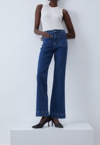 Anna Field Flared jeans - dark-blue denim
