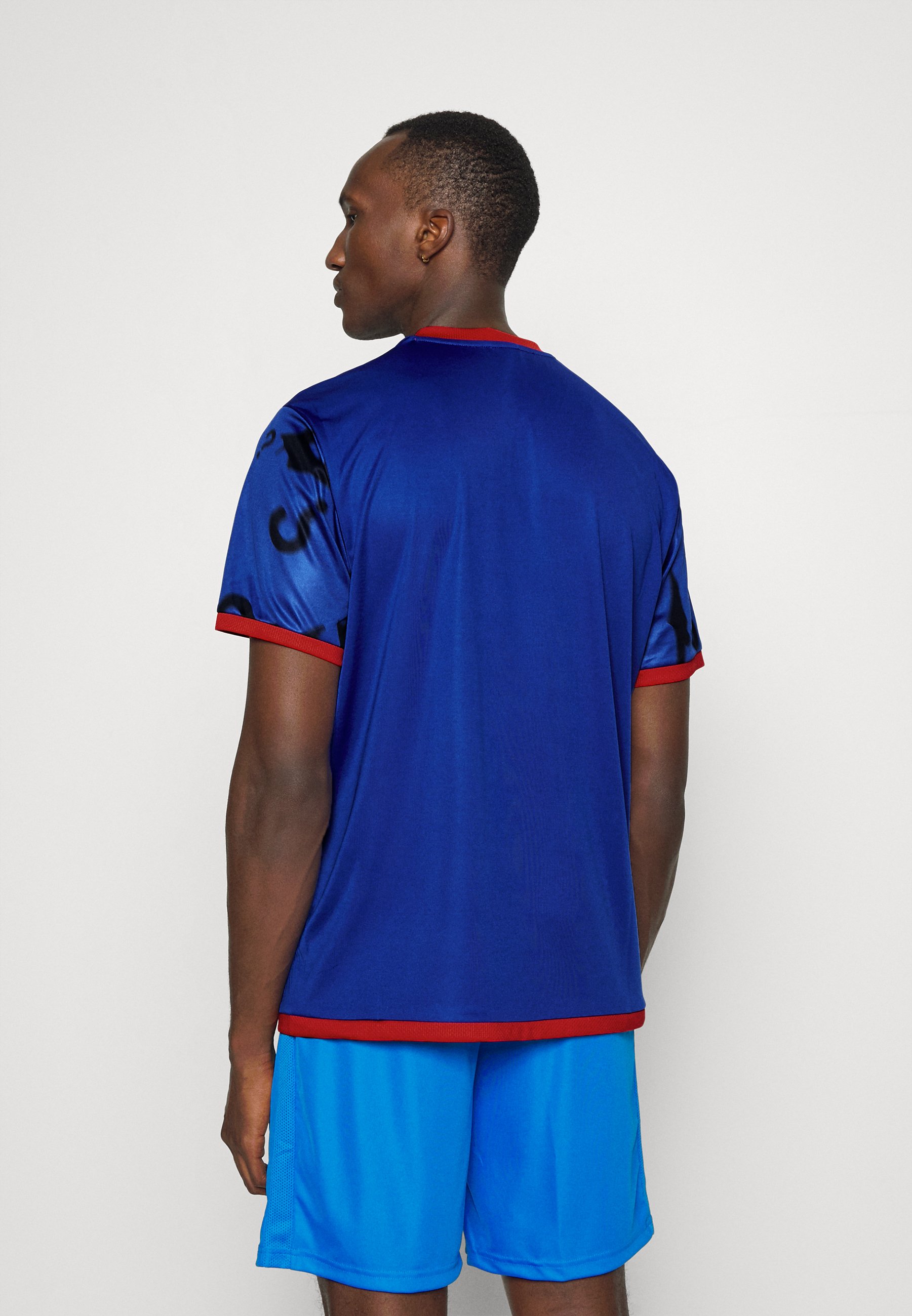 Puma BATMAN GRAPHIC TEE - Print T-shirt 