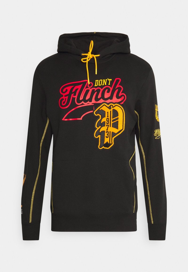 Hoodie noir avec cordon de serrage, arborant un texte vibrant "NE FLÉCHIS PAS" en rose et un logo accentué de jaune. Comprend des coutures latérales et des poignets côtelés.