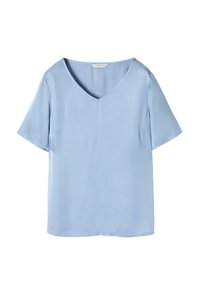 Blouse bleu clair à manches courtes en tissu lisse. Dotée d'un décolleté en V et de deux poches latérales discrètes. Design simple et décontracté.