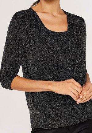 Blusa - black