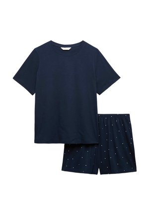 T-shirt bleu marine à manches courtes associé à un short bleu marine avec de petits pois blancs, présenté à plat sur un fond blanc.