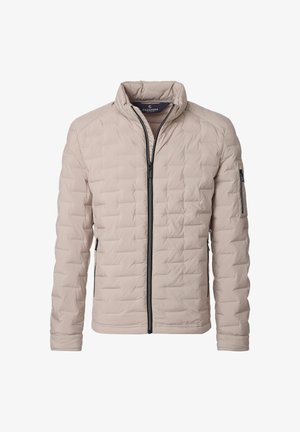 Veste matelassée beige clair avec fermeture éclair noire intégrale, col montant, deux poches latérales zippées et une poche zippée sur la manche gauche.