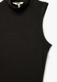 Top nero senza maniche con colletto alto realizzato in cotone morbido; presenta una vestibilità slim e una texture liscia con una leggerissima lucentezza sul tessuto.