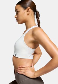 On PERFORMANCE FLEX  - Urheiluliivit: keskitason tuki - undyed white
