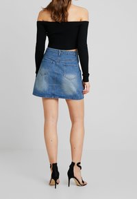 Missguided Stickad tröja - black
